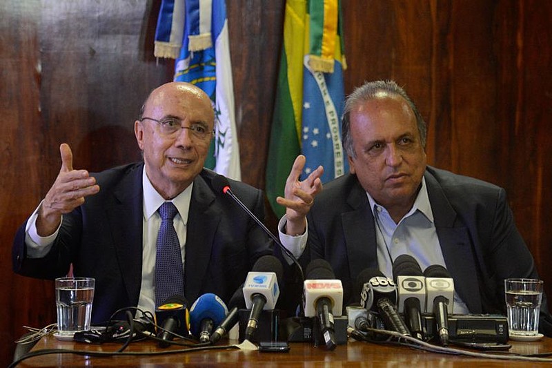O então ministro da Fazenda, Henrique Meirelles, e o governador do Rio, Luiz Fernando Pezão, em reunião sobre o regime de recuperação fiscal