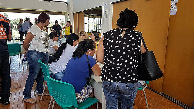 Families wait for news from rescue crews in Brumadinho after Vale dam disaster