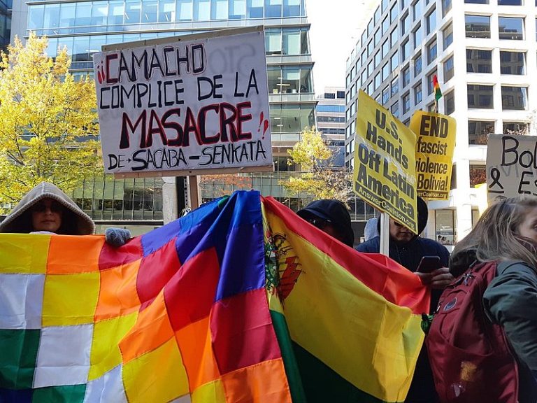 A protest against Bolivian politician Luis Fernando Camacho takes place in Washington,DC on December 12, 2019