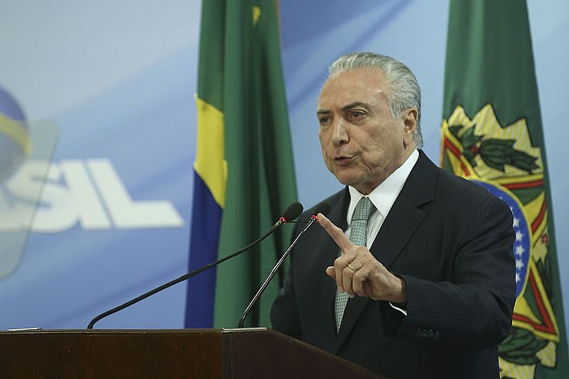 Temer durante pronunciamento nesta quinta (18), dizendo que não renunciaria