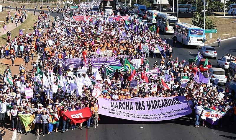 A Marcha tem como lema: Margaridas por luta por um Brasil com soberania popular, democracia, justiça, igualdade e livre de violência