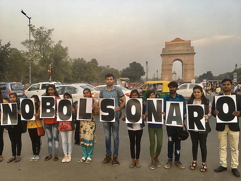 Manifestantes contra a presença de Bolsonaro como líder convidado pelo governo indiano para a comemoração do Dia da República