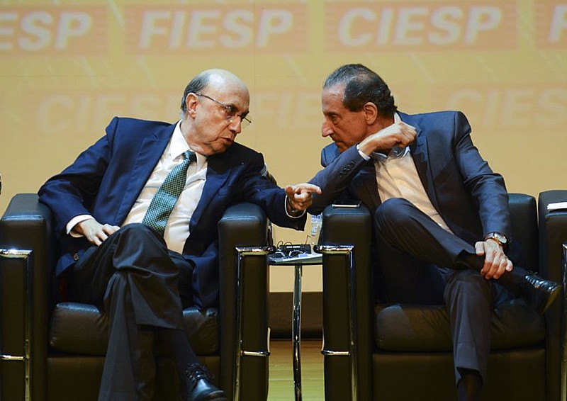 O ministro da Fazenda, Henrique Meirelles, participa de evento na Fiesp, ao lado do presidente da entidade, Paulo Skaf
