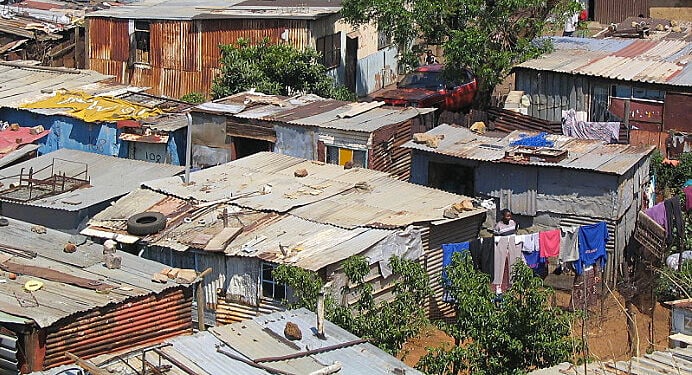 Capitalismo e Apartheid: dois lados da mesma moeda