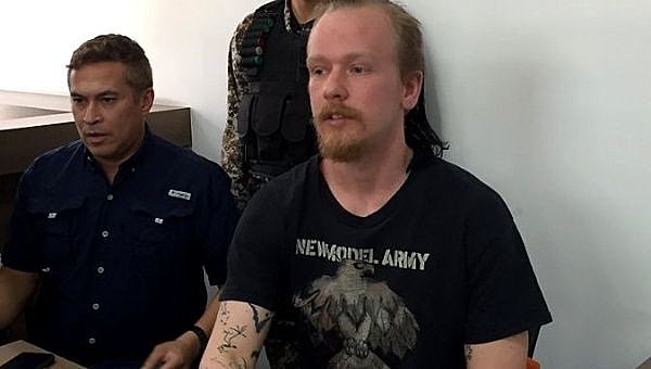 Bini durante audiência de custódia que garantiu o direito de responder em liberdade