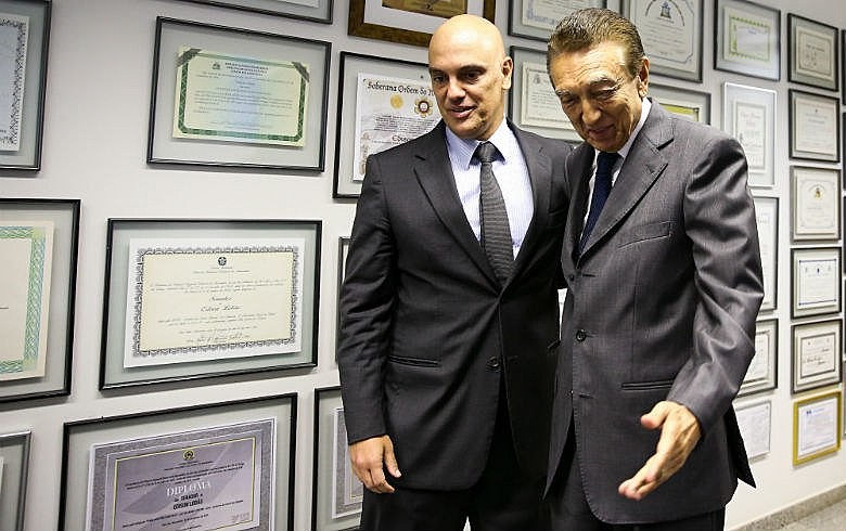 Moraes com o senador Edison Lobão: exposição pública na busca pelo cargo e a pecha de "cara de pau"