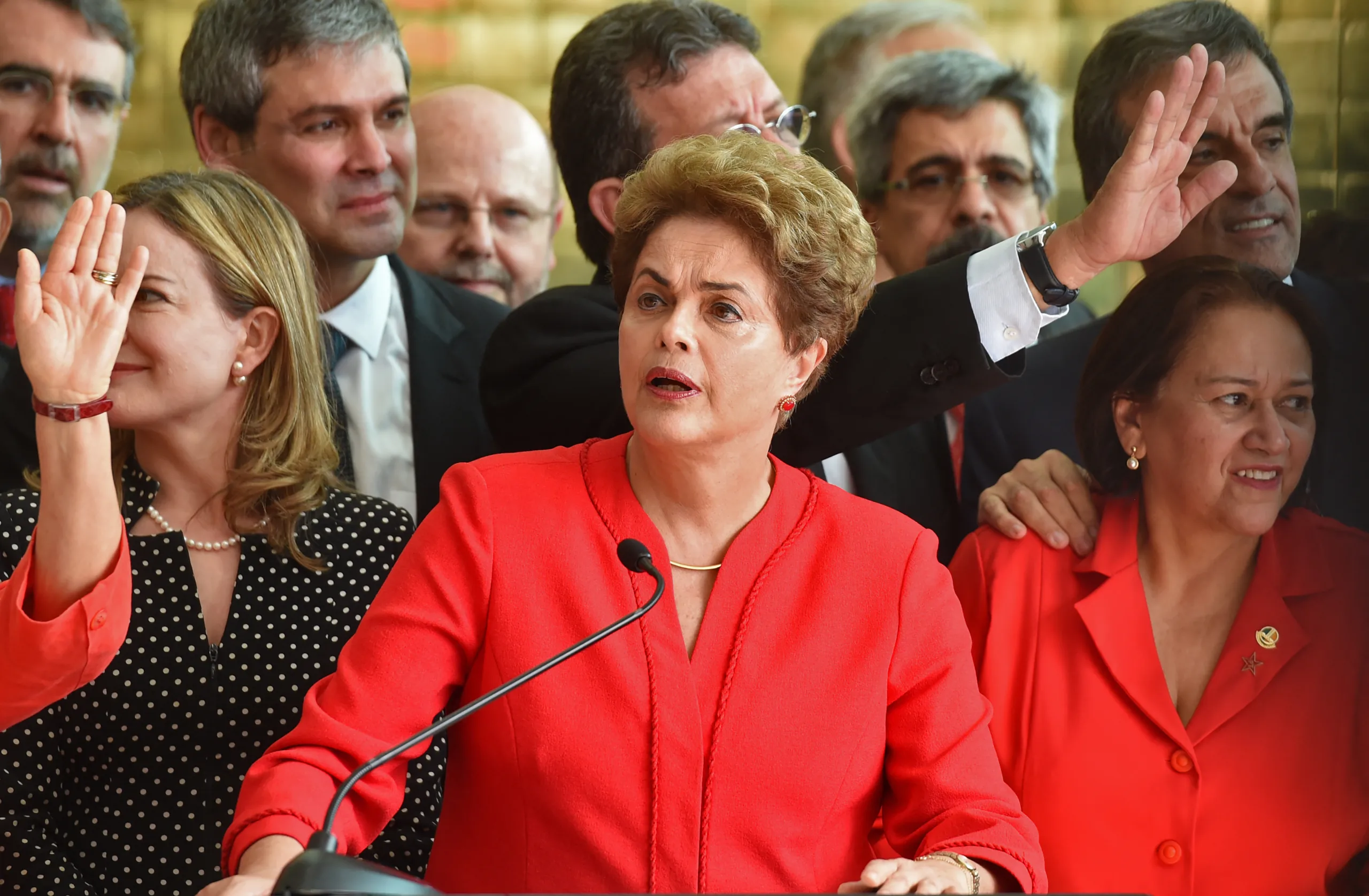 Brazil's Dilma Rousseff speaks at the Alvorada presidential palace in Brasilia after she was stripped of the country's presidency in a Senate impeachment vote on August 31, 2016. Rousseff was stripped of the country's presidency Wednesday in a Senate impeachment vote ending 13 years of leftist rule in Latin America's biggest economy. Rousseff, 68, was convicted by 61 of the 81 senators of illegally manipulating the national budget. The vote, passing the needed two-thirds majority, meant she was immediately removed from office. (Photo by EVARISTO SA / AFP)