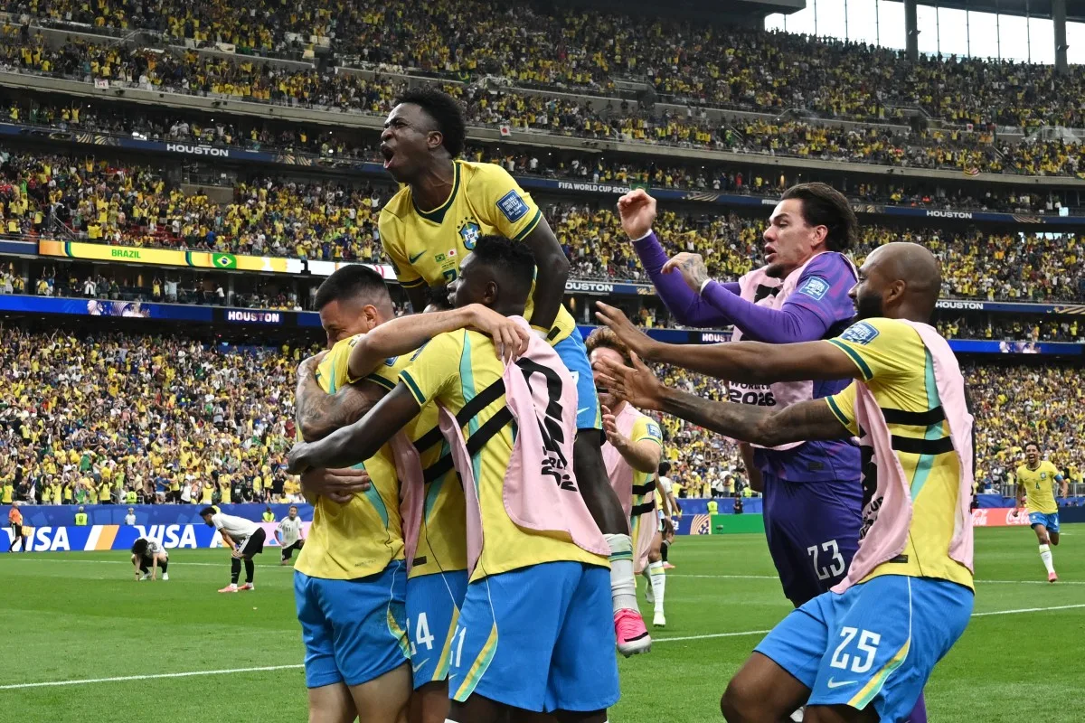 Brazil's players celebrate their second goal during the 2026 World Cup round of 32 football match between Brazil and Japan at the Houston Stadium in Houston on June 29, 2026. (Photo by Paul ELLIS / AFP)