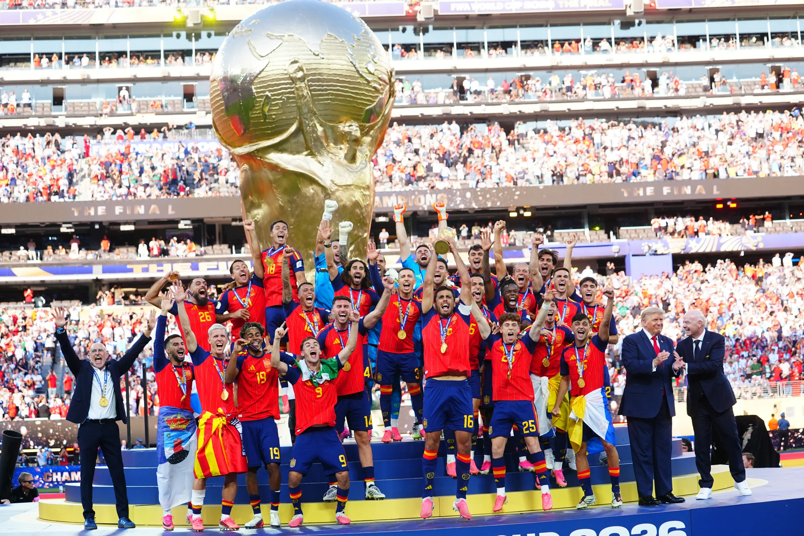 EAST RUTHERFORD, NEW JERSEY - JULY 19: Players of Spain celebrate with the trophy after winning the 2026 FIFA World Cup during the FIFA World Cup 2026 Final match between Spain and Argentina at New York New Jersey Stadium on July 19, 2026 in East Rutherford, United States. Evrim Aydin / Anadolu (Photo by Evrim Aydin / Anadolu via AFP)